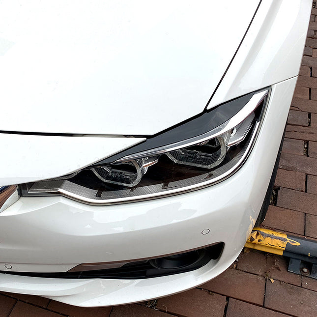 Strålkastarögonbryn i blanksvart för BMW 3-serie F30/F31