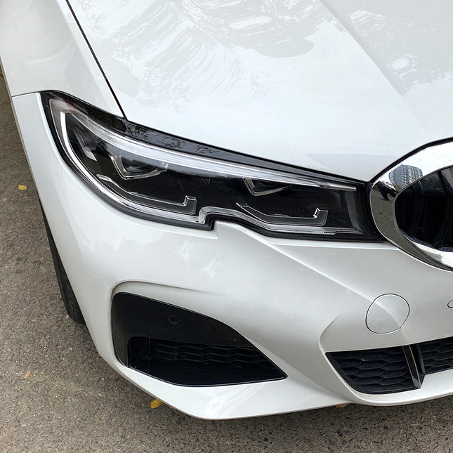 Strålkastarögonbryn i blanksvart för BMW 3-serie G20/G21 (före facelift)