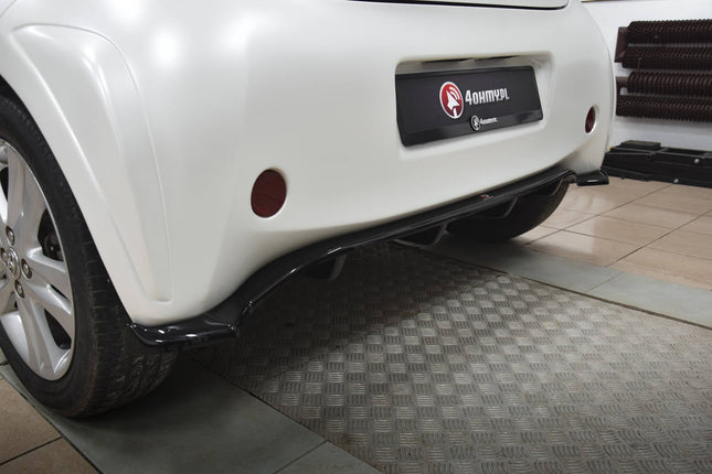 Diffuser med vertikala stag för Toyota IQ